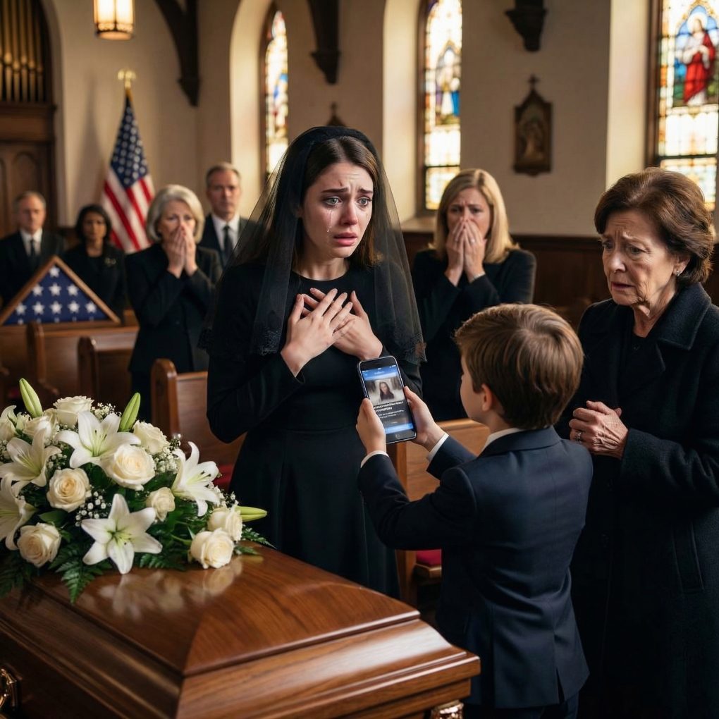 Na pogrzebie mojego męża jego matka spojrzała mi prosto w oczy i powiedziała: „Lepiej, żeby odszedł, niż żebym żył z hańbą, którą mi przyniosła”. Rozległ się pomruk aprobaty. Otworzyłam usta, żeby coś powiedzieć – ale wtedy mój ośmioletni syn wstał, ściskając telefon ojca. Jego cichy głos przeciął pokój. „Kłamiesz”. Cisza, która zapadła, była cięższa niż żal… bo miał im pokazać coś, czego nie mogli zaprzeczyć.